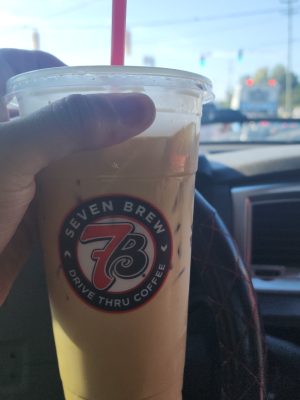 A drink in the cupholder on the way to the next pickup