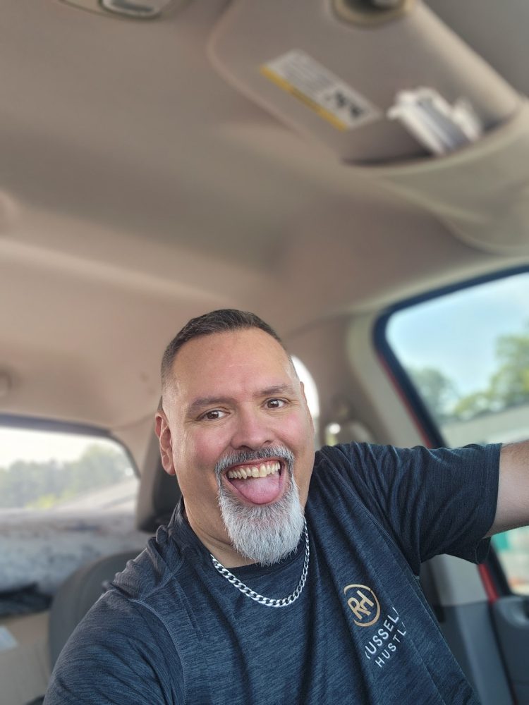 Russell E. Brown in his truck, out picking around Chattanooga